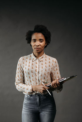 Female teacher holding papers